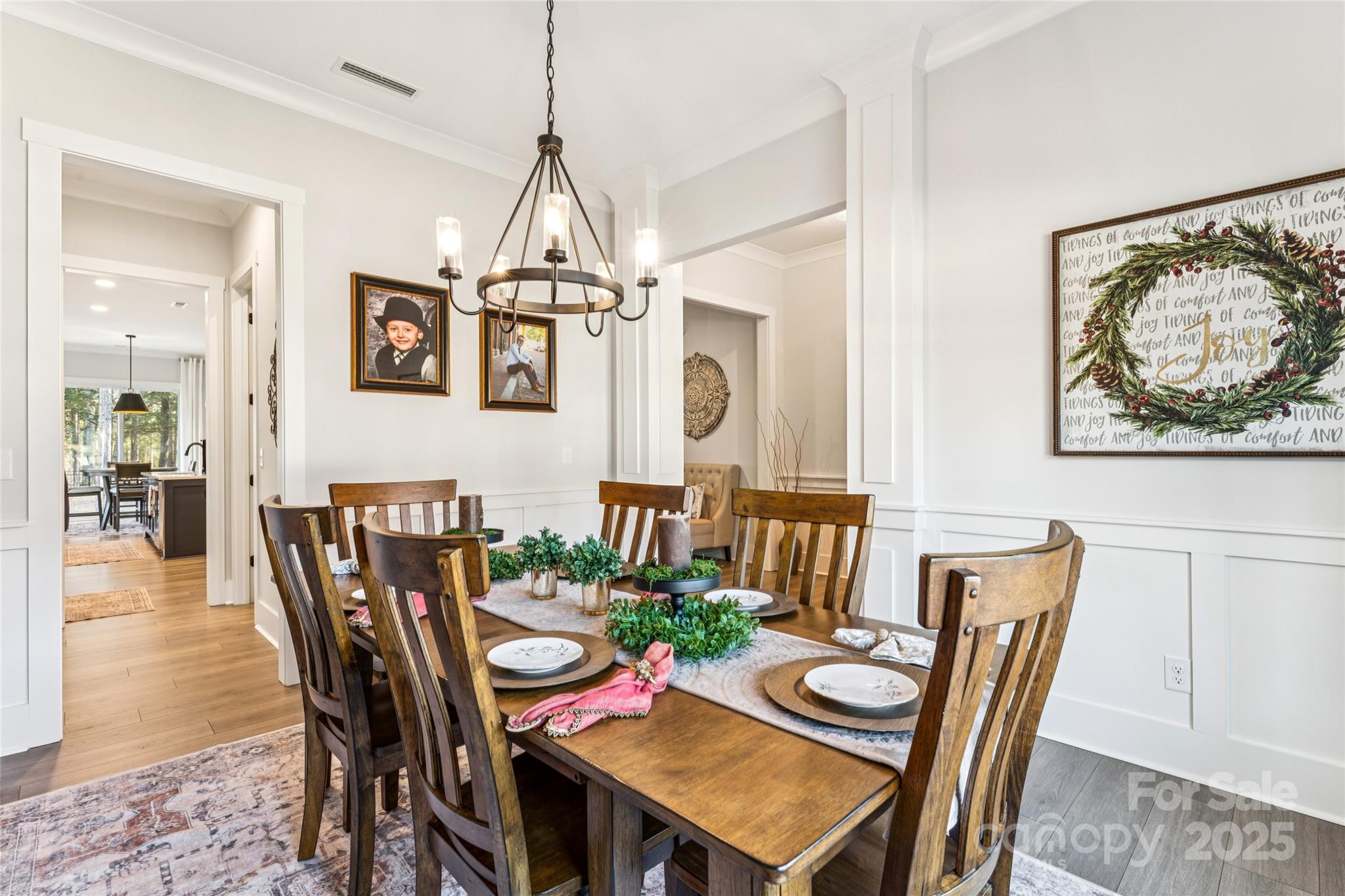 7822 Russell Road Indian Trail, NC 28079 - Photo 7 of 48 a view of a dining room with furniture window and wooden floor