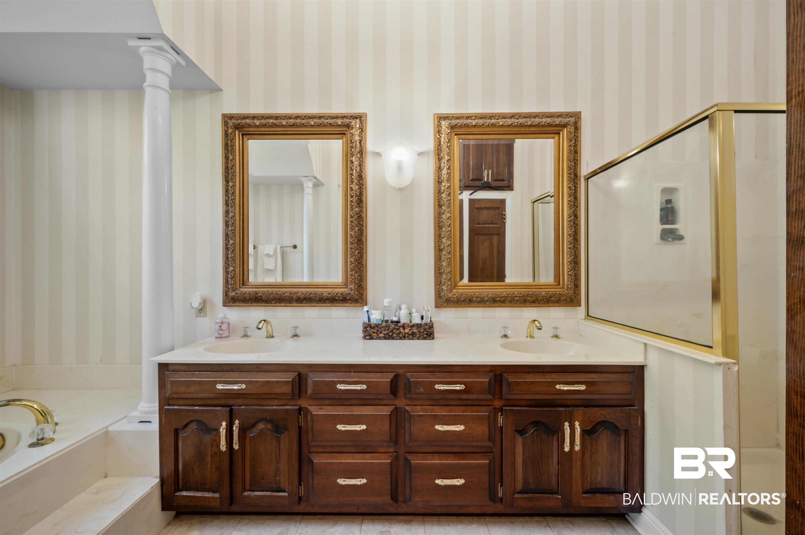141 Blue Ridge Drive Monroeville, AL 36460 - Photo 23 of 40 Bathroom with wallpapered walls, double vanity, and a bath