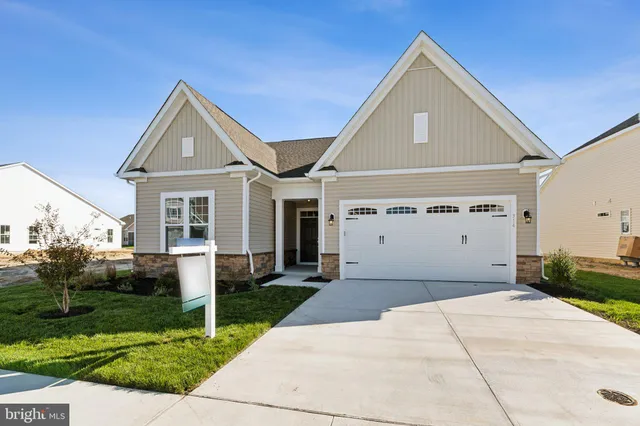 a front view of house with yard