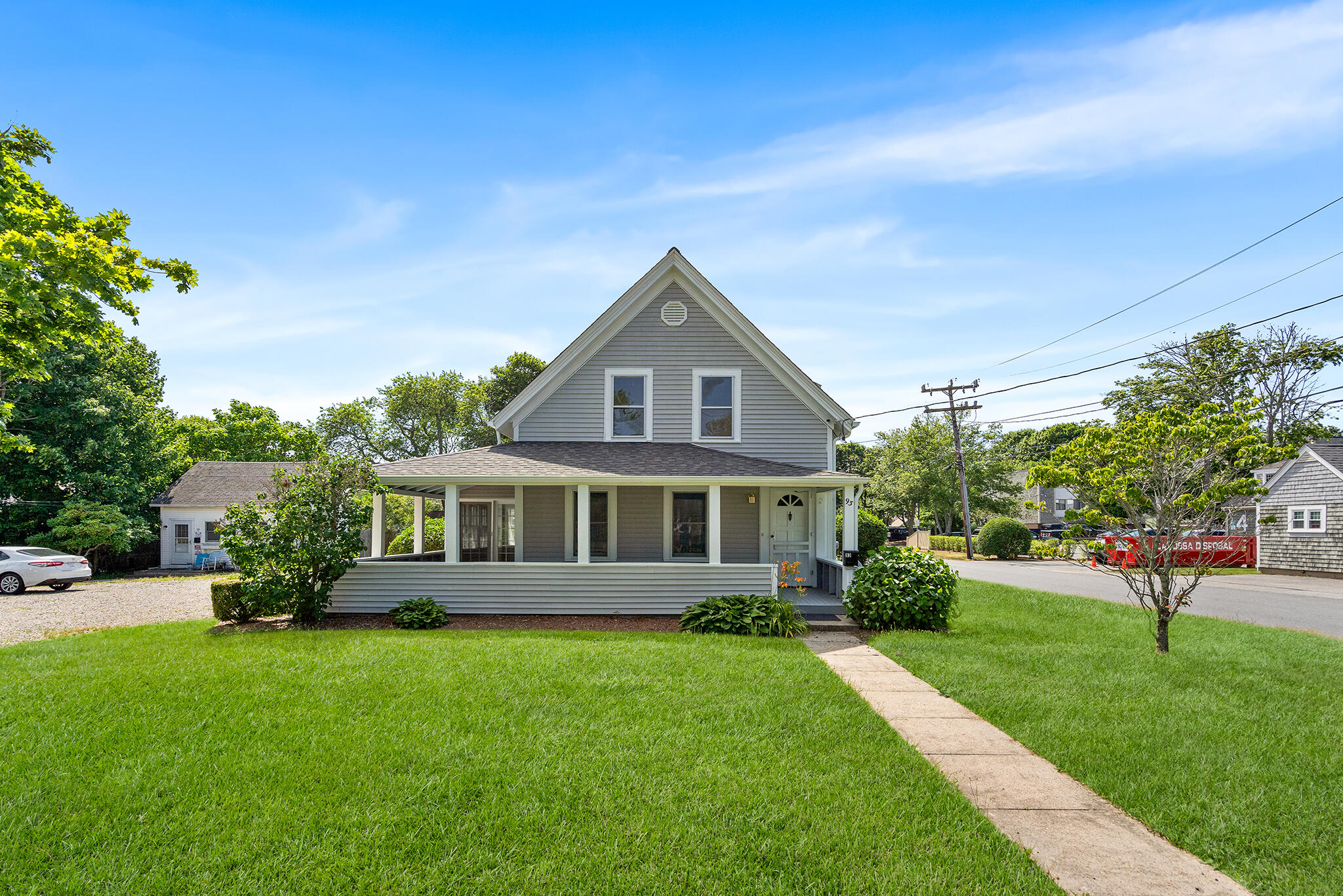 a front view of a house with a yard