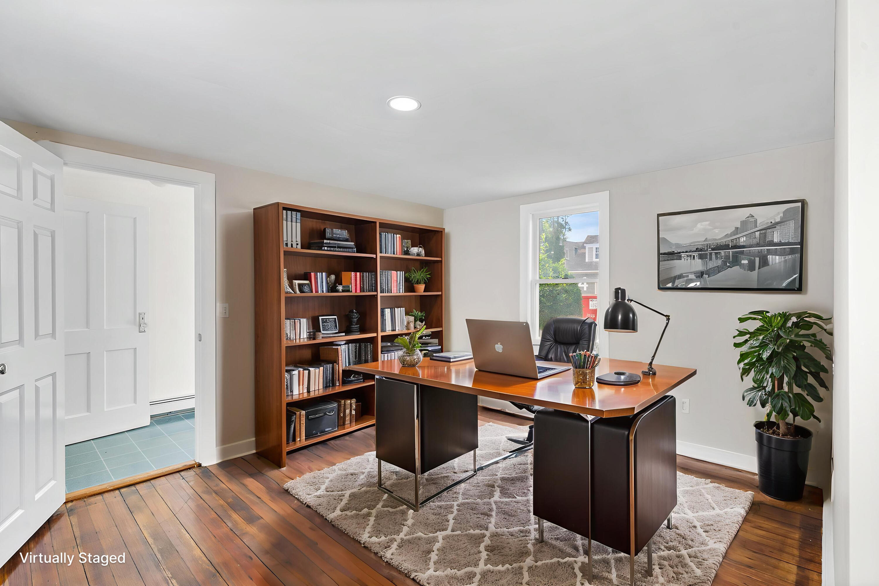 93 Sea Street Hyannis, MA 02601 - Photo 15 of 30 a work room with furniture and wooden floor
