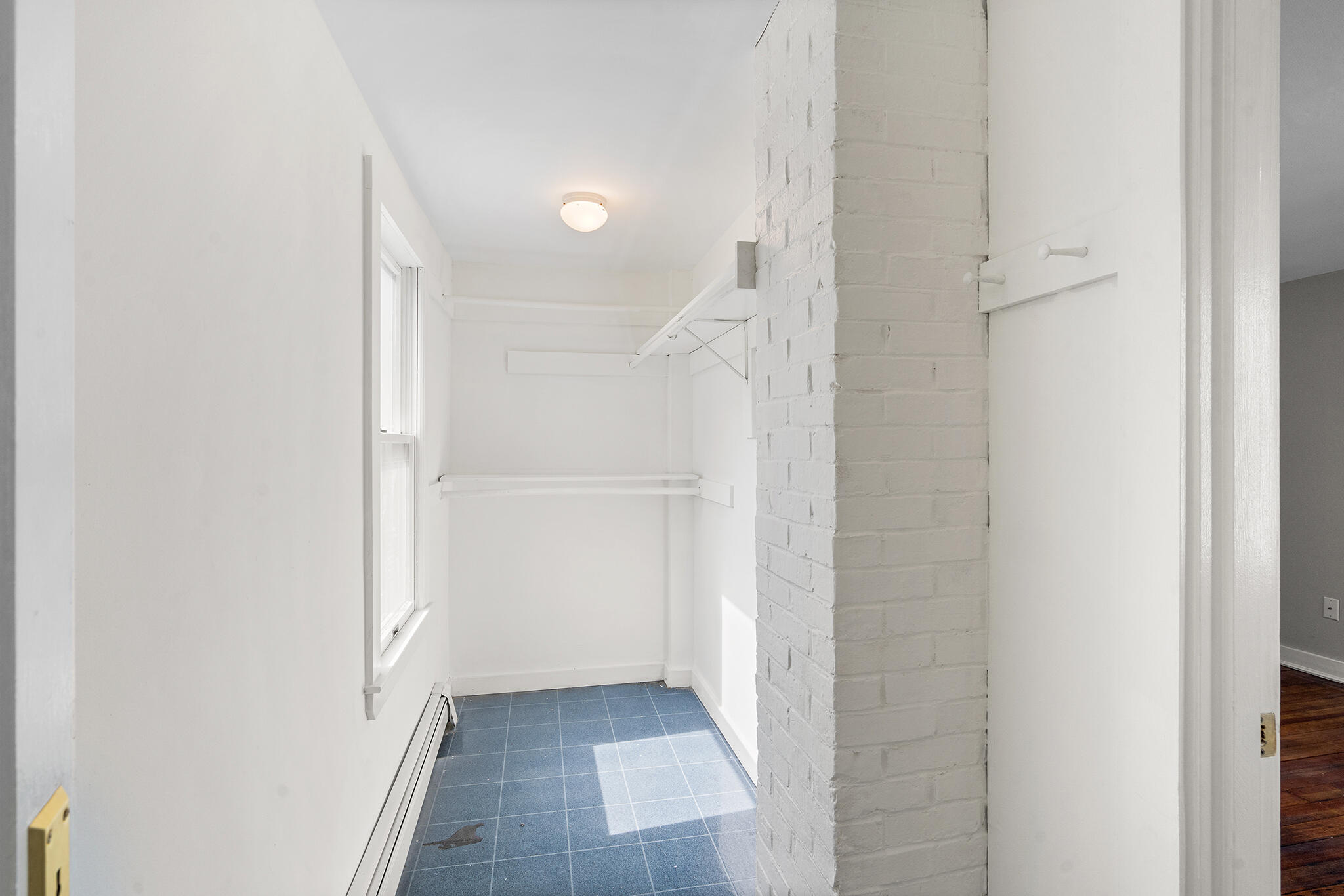93 Sea Street Hyannis, MA 02601 - Photo 16 of 30 a view of a hallway with white walls