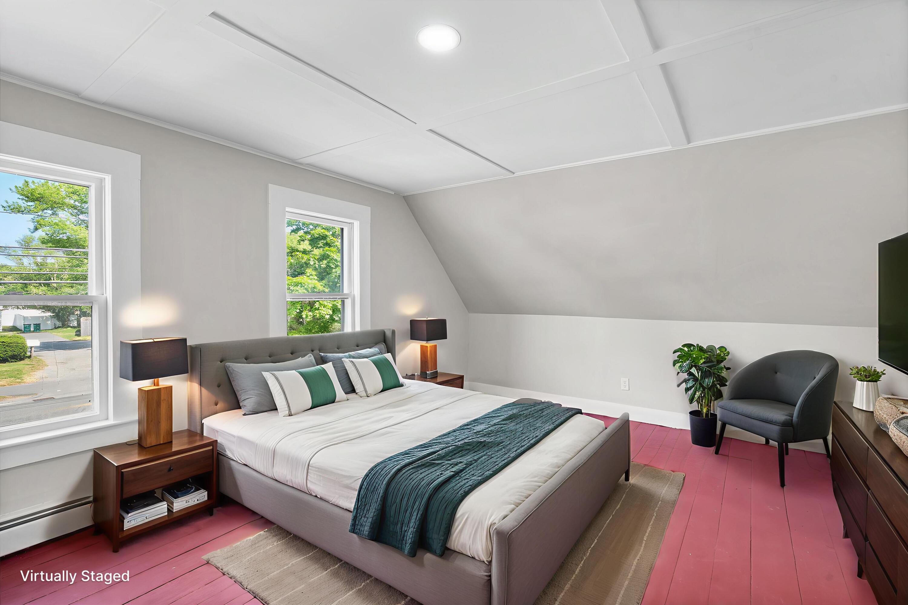 93 Sea Street Hyannis, MA 02601 - Photo 18 of 30 a bedroom with a bed a table and chair with the potted plant