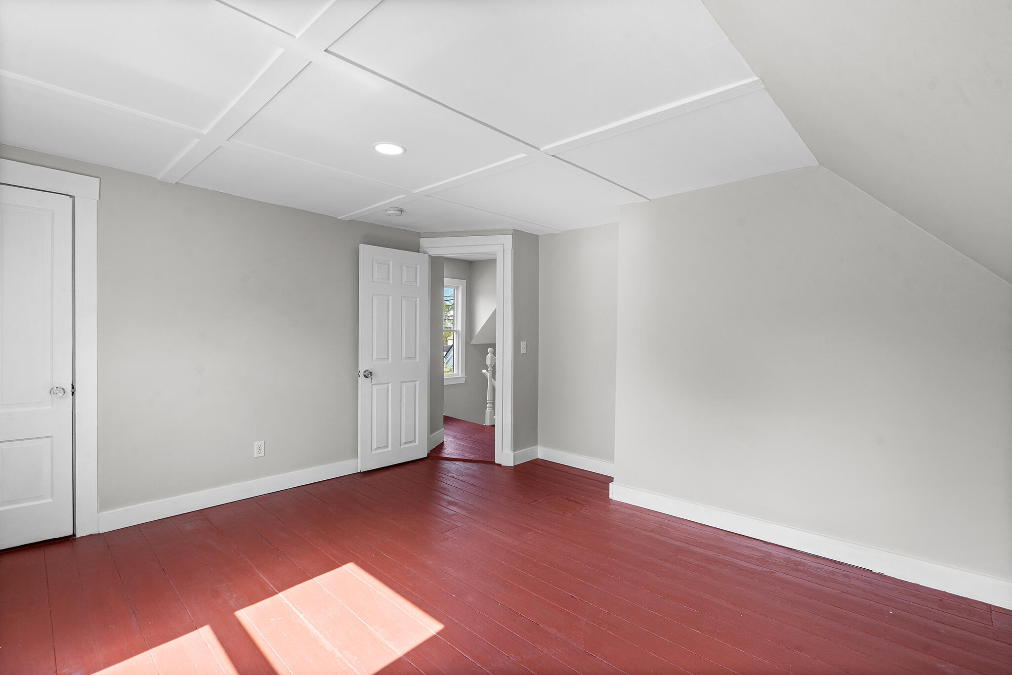 93 Sea Street Hyannis, MA 02601 - Photo 21 of 30 an empty room with wooden floor and windows