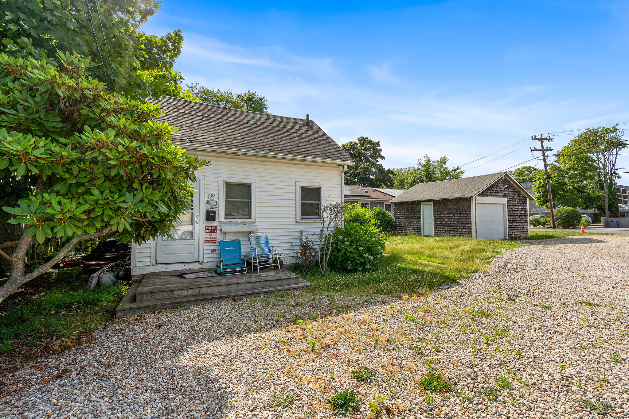 93 Sea Street Hyannis, MA 02601 - Photo 26 of 30 a front view of a house with a yard