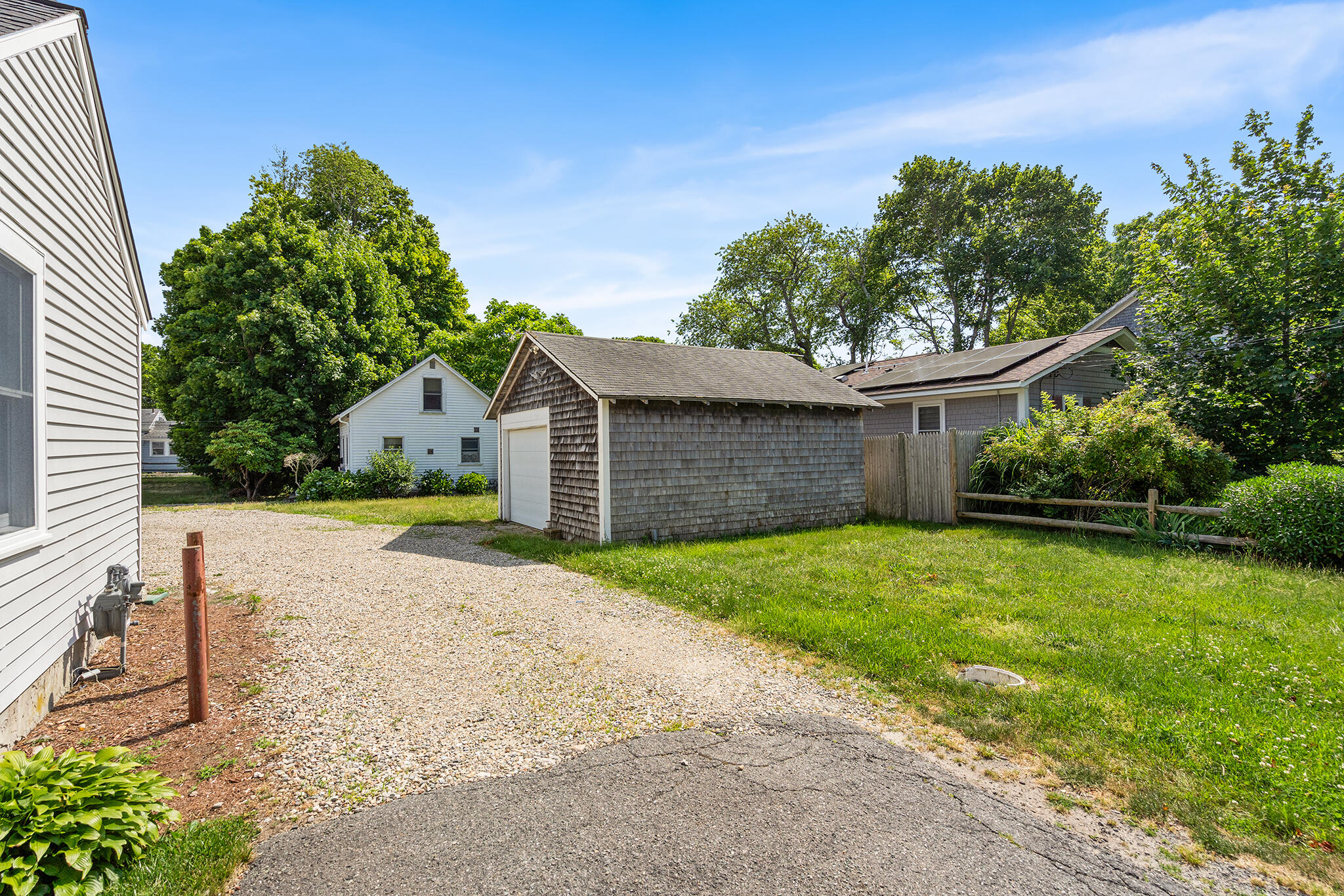 93 Sea Street Hyannis, MA 02601 - Photo 29 of 30 a front view of a house with garden