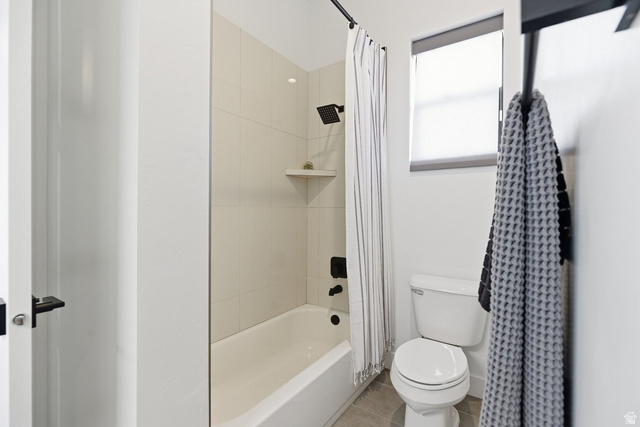 2197 Reserve Circle St. George, UT 84770 - Photo 36 of 57 Full bath featuring shower / bath combination with curtain and light tile patterned floors