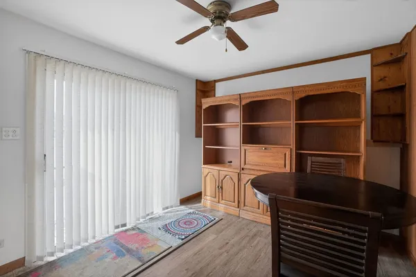 a view of a workspace with furniture