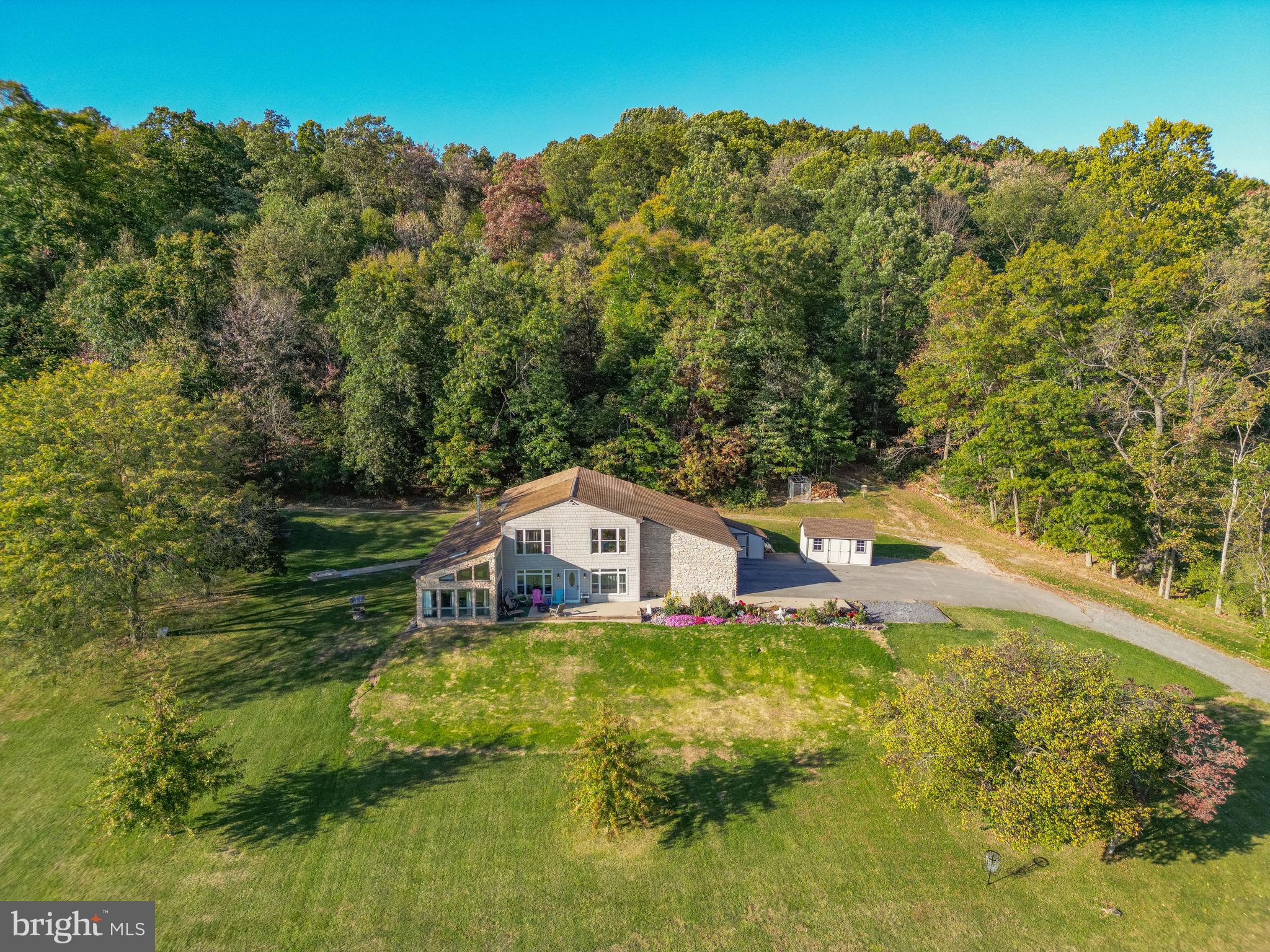 338 Culp Road Sunbury, PA 17801 - Photo 11 of 43 a house with river in front of it