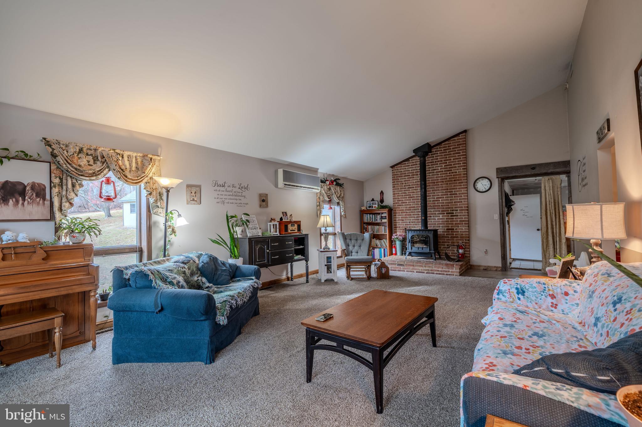 338 Culp Road Sunbury, PA 17801 - Photo 14 of 43 a living room with furniture and a flat screen tv