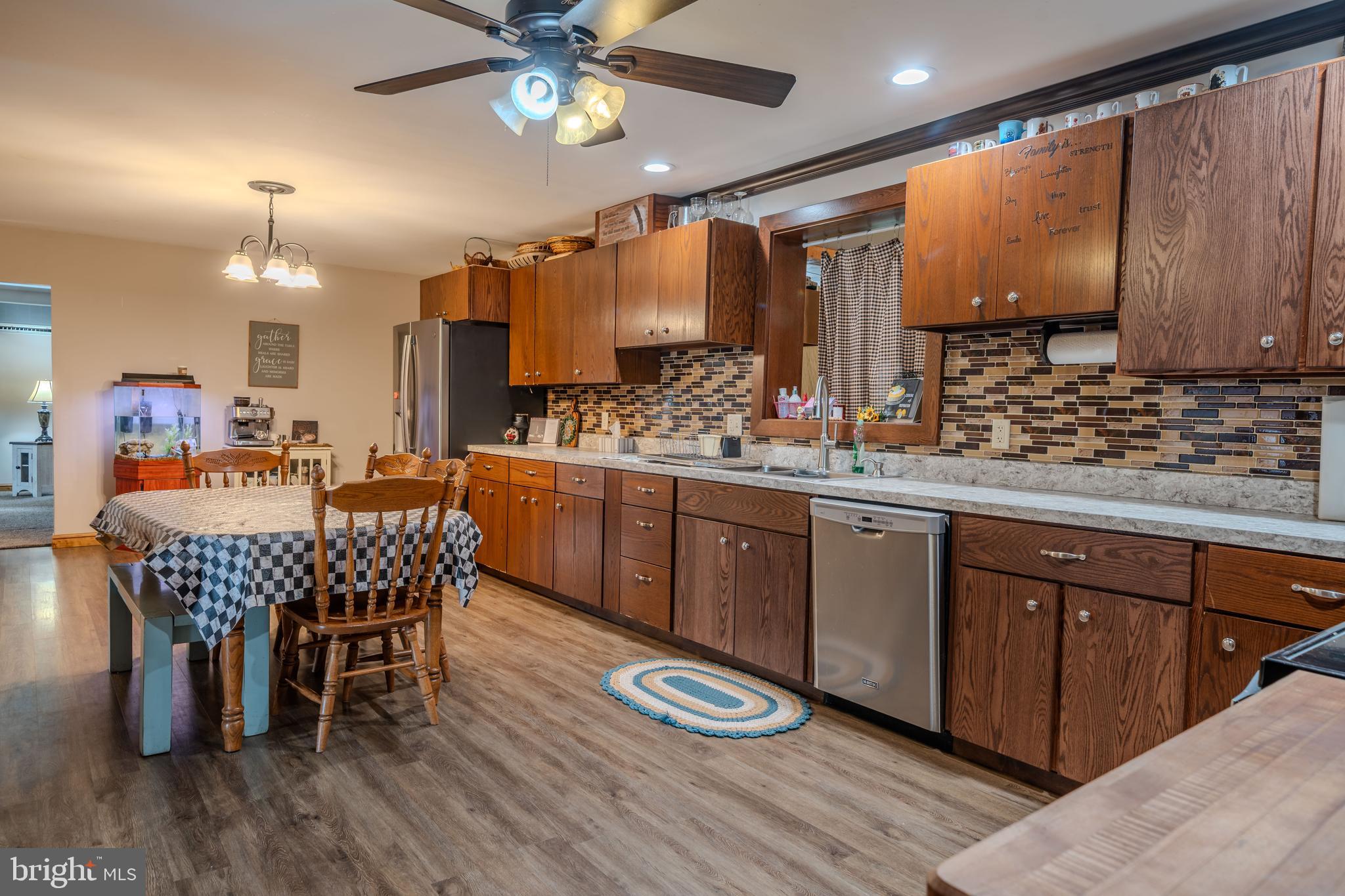 338 Culp Road Sunbury, PA 17801 - Photo 21 of 43 a large kitchen with a table and chairs