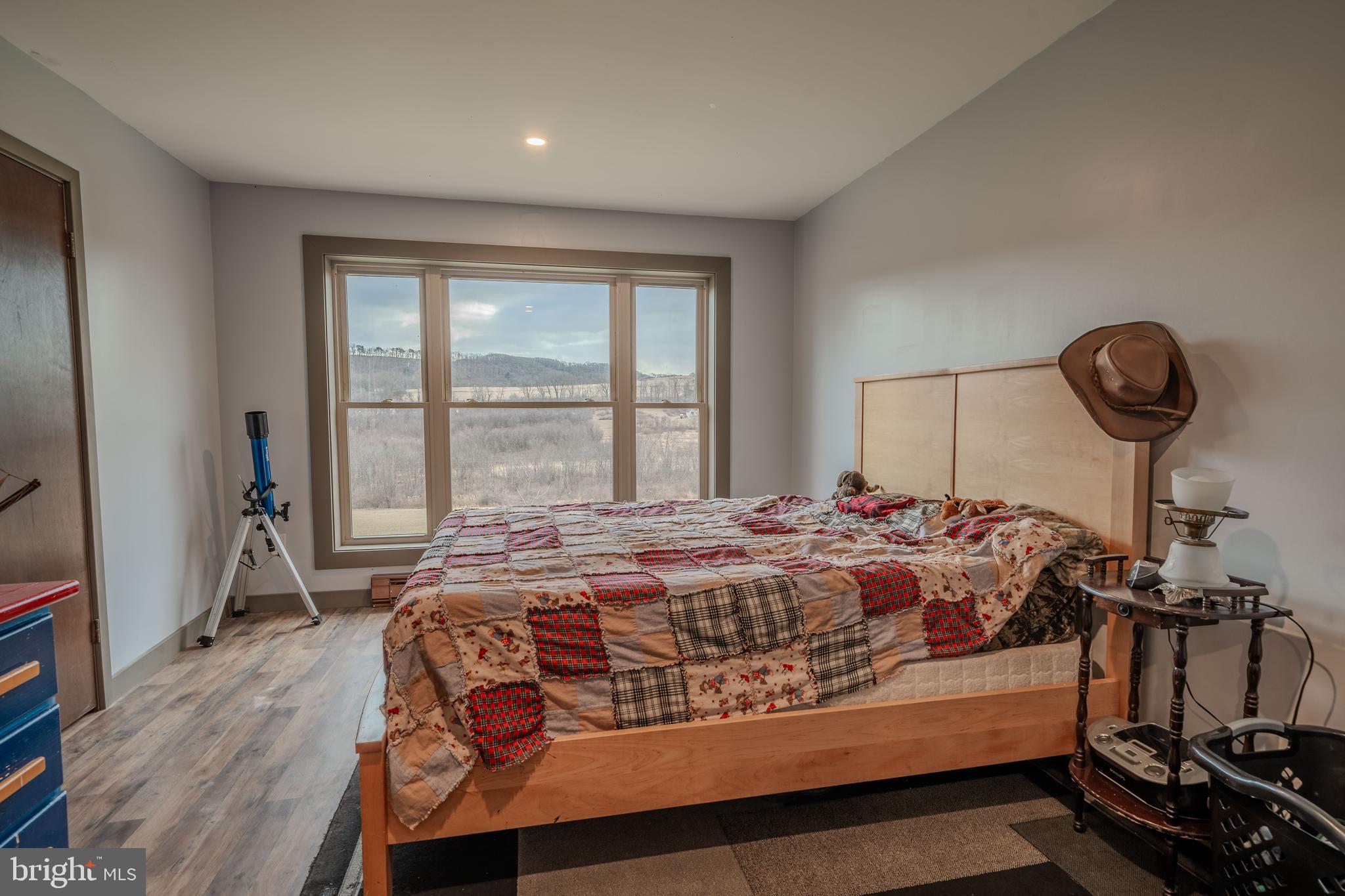 338 Culp Road Sunbury, PA 17801 - Photo 28 of 43 a bed sitting in a bedroom next to a window