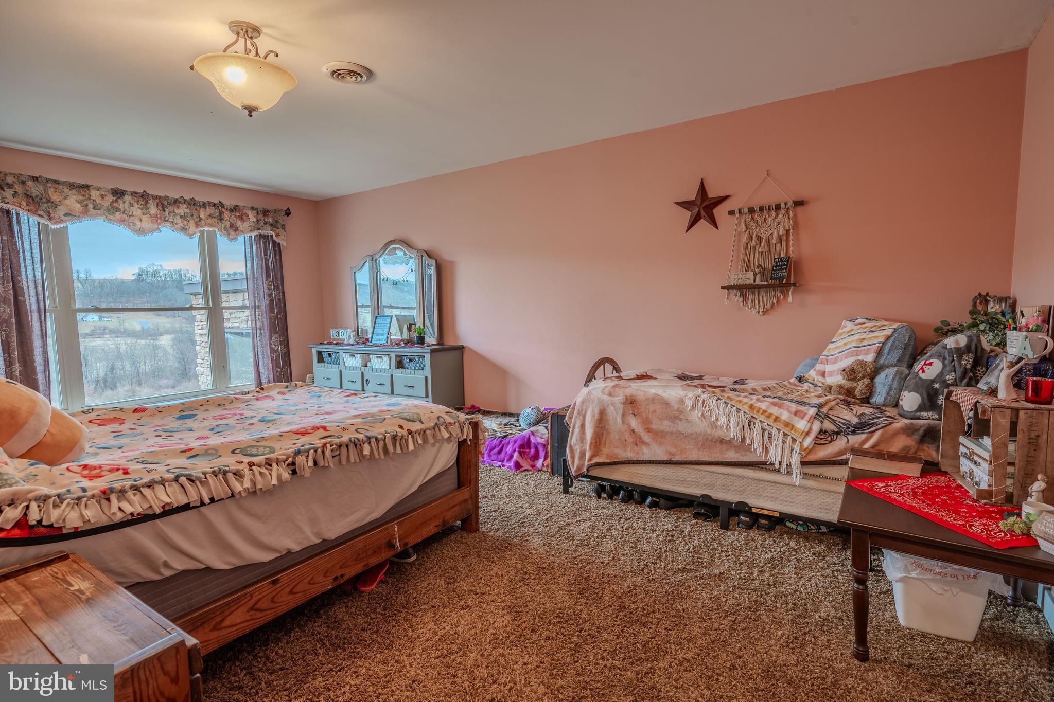 338 Culp Road Sunbury, PA 17801 - Photo 29 of 43 a bedroom with a bed and a table