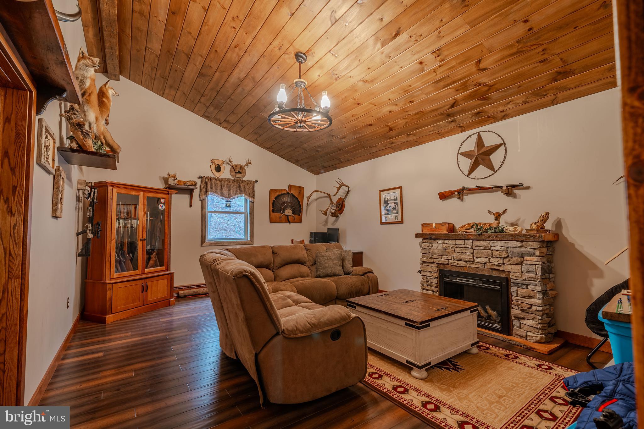 338 Culp Road Sunbury, PA 17801 - Photo 30 of 43 a living room with furniture and a fireplace