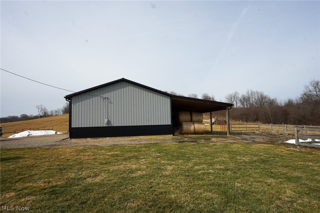 1325 County Line Road Hopewell, OH 43746 - Photo 30 of 45 View of pole building with a view of rural / pastoral area and a carport