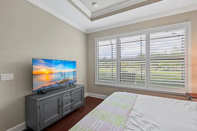 a spacious bathroom with double vanity and a mirror