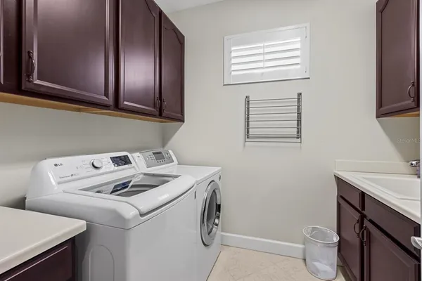 a bed room with a bed and a night stand