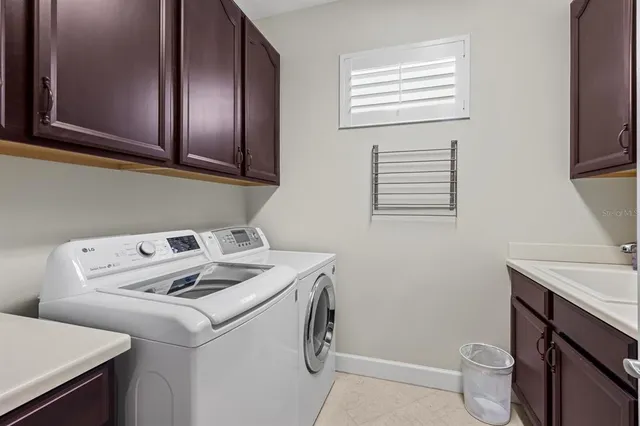 a bed room with a bed and a night stand