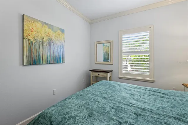 a bathroom with a granite countertop double vanity sink mirror and
