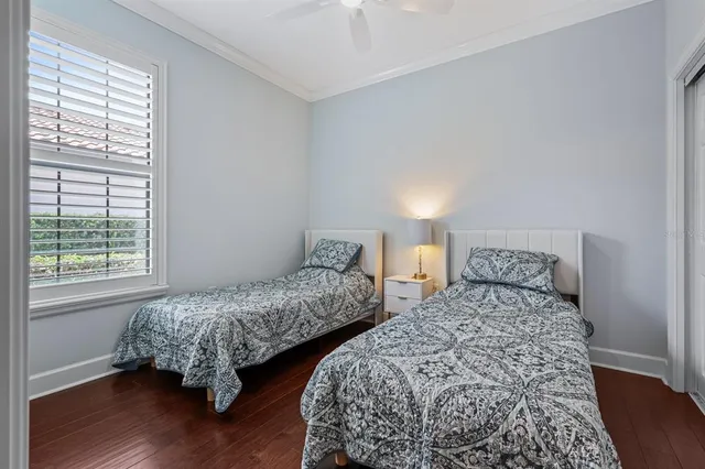 a view of a patio with a table chairs and a backyard