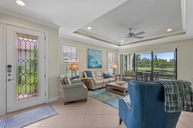 a large white kitchen with lots of counter space and window
