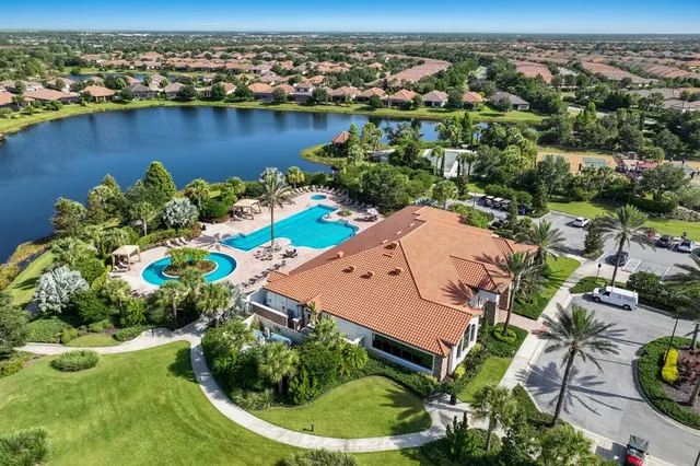 a patio with a table and chairs