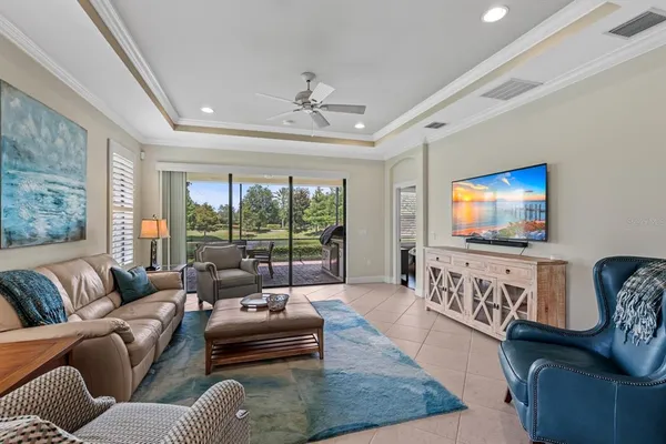 a kitchen with granite countertop wooden cabinets and stainless steel appliances