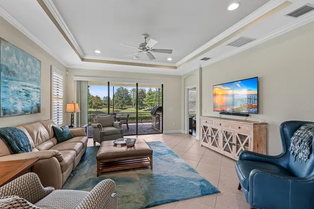 a kitchen with granite countertop wooden cabinets and stainless steel appliances