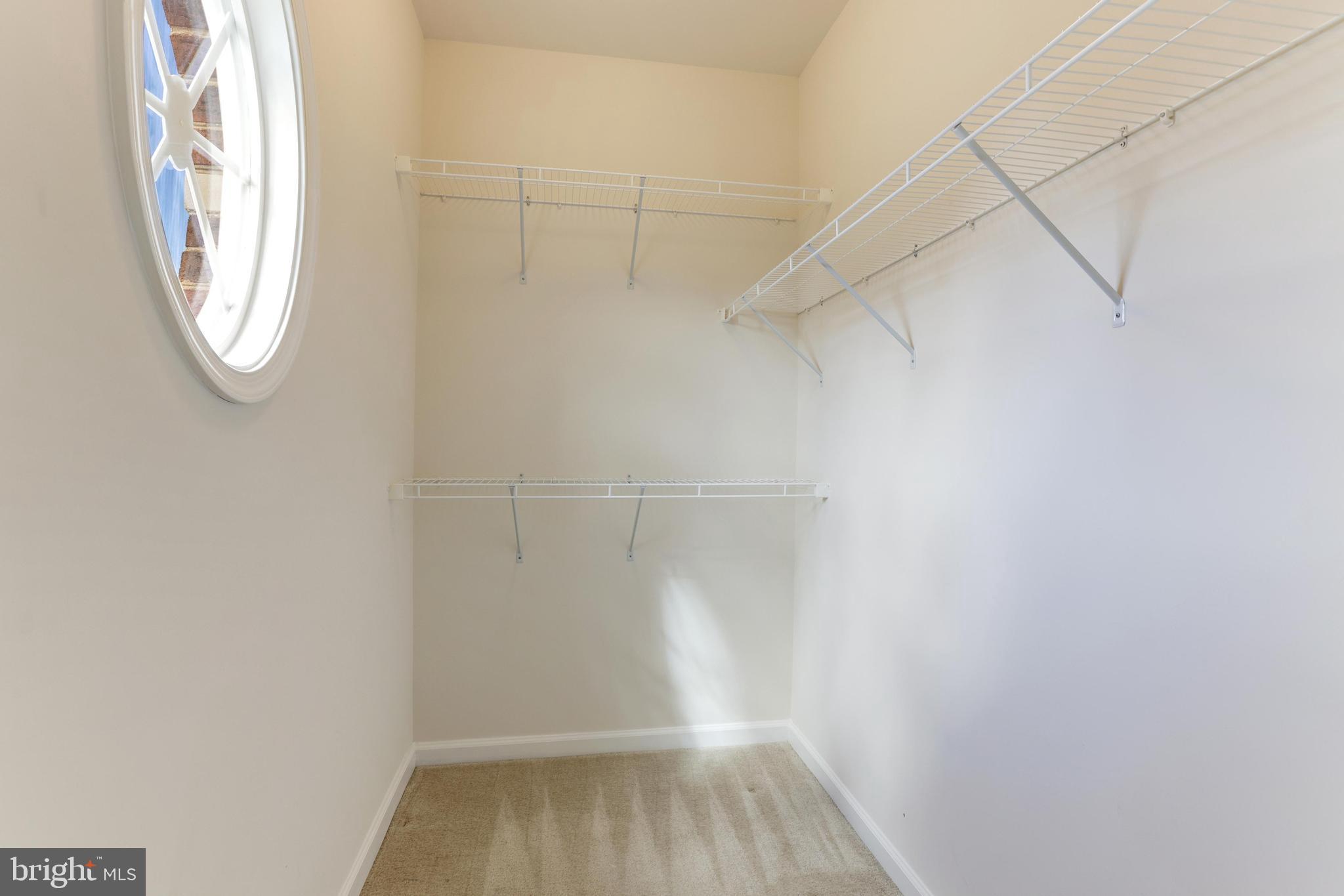 13643 Air And Parkway, Unit MUSEUM 9L Herndon, VA 20171 - Photo 39 of 45 a view of a small space with racks on the wall