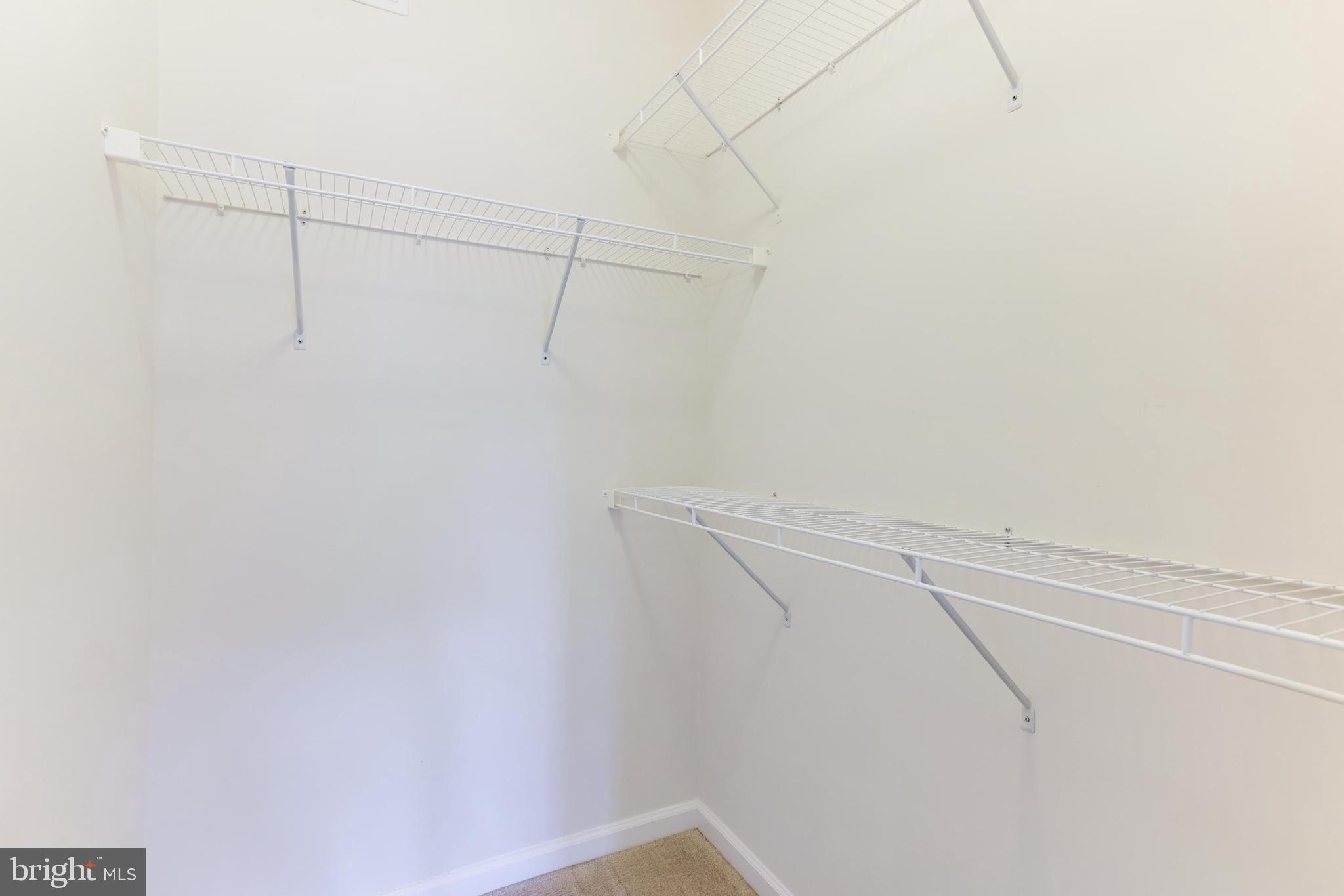 13643 Air And Parkway, Unit MUSEUM 9L Herndon, VA 20171 - Photo 40 of 45 a view of a room with racks on the wall