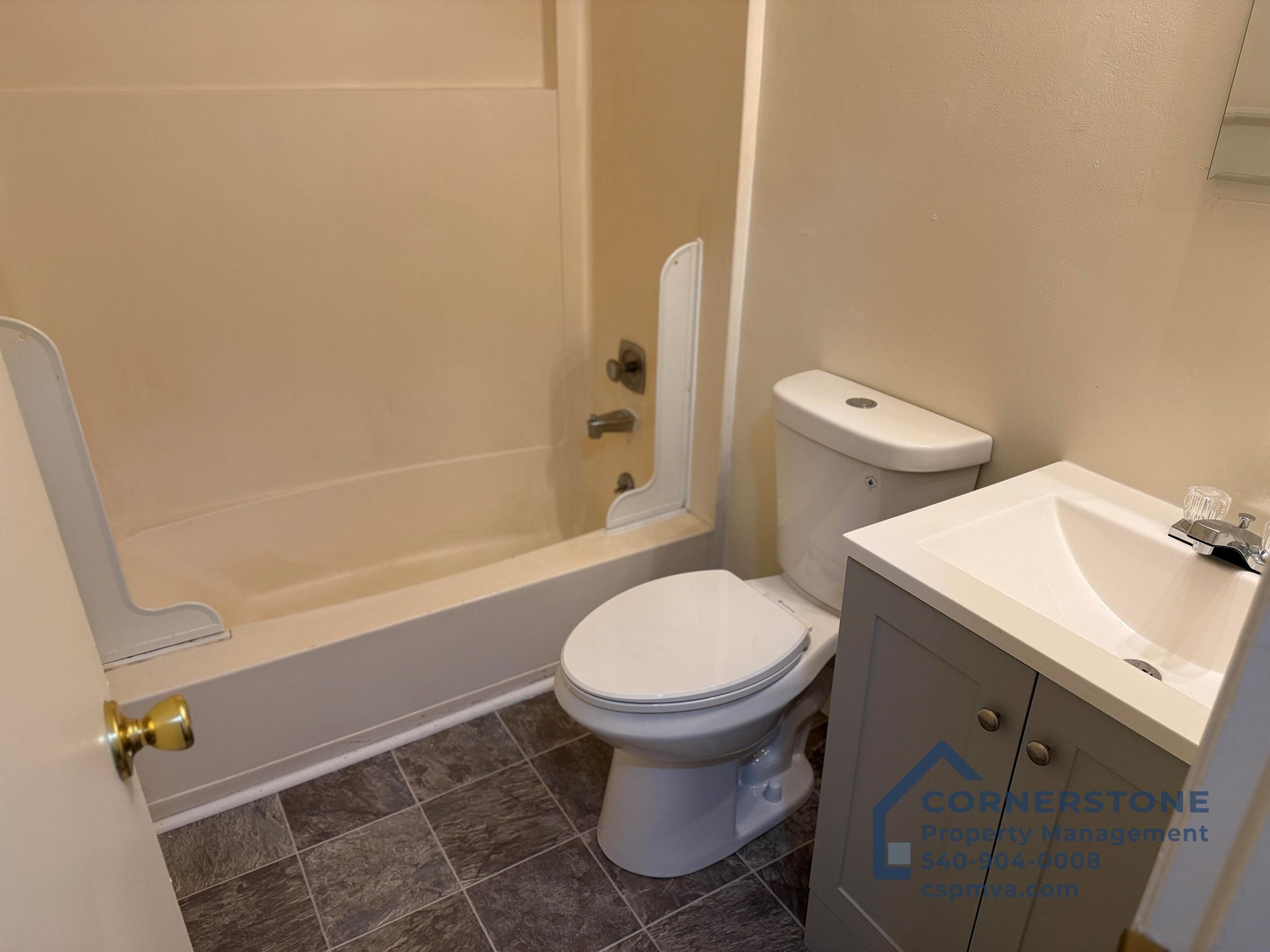 6700 Shingle Rdg Road, Unit 8B Roanoke, VA 24018 - Photo 11 of 13 a bathroom with a sink toilet and shower