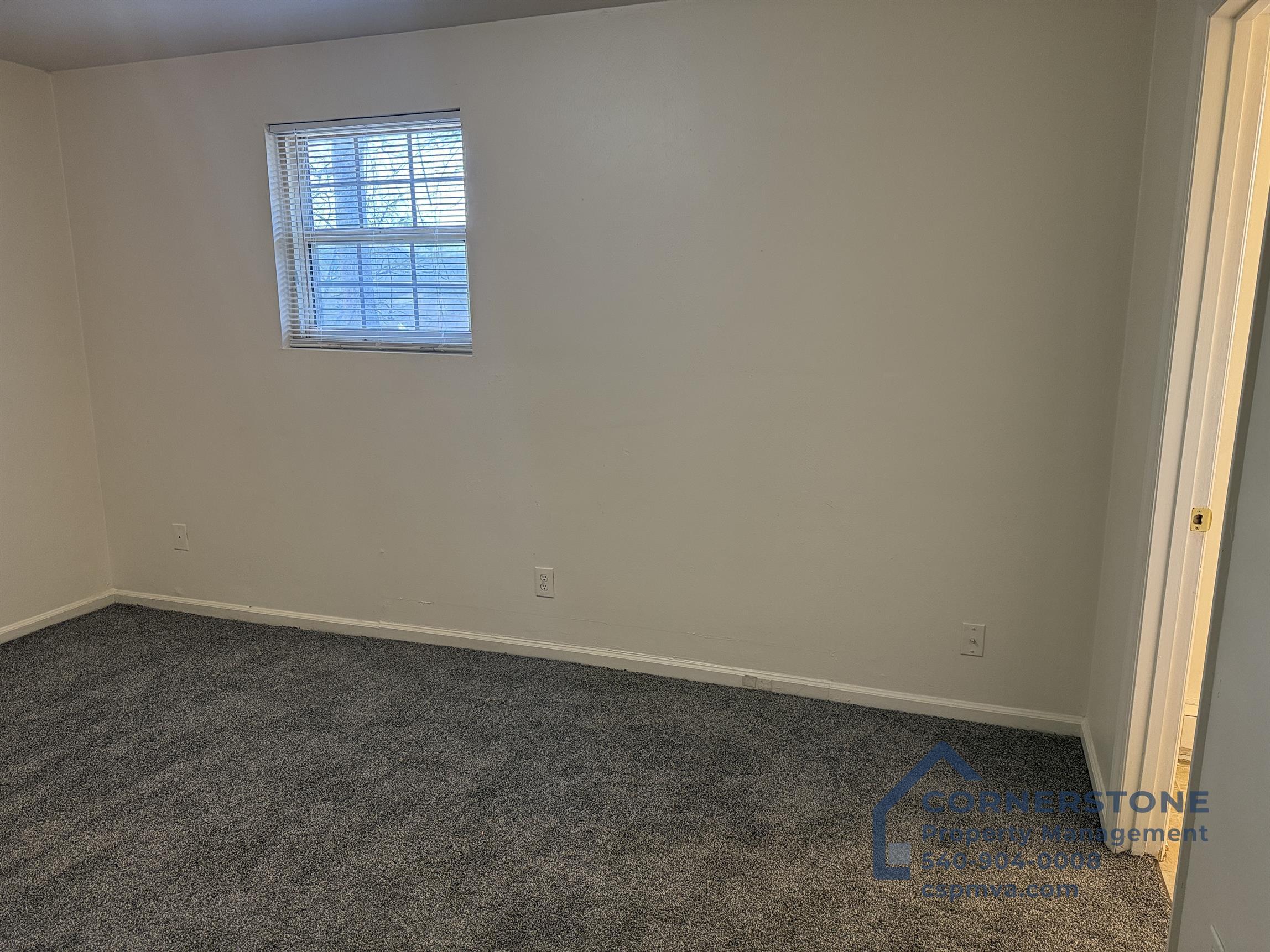 6700 Shingle Rdg Road, Unit 8B Roanoke, VA 24018 - Photo 6 of 13 an empty room with windows