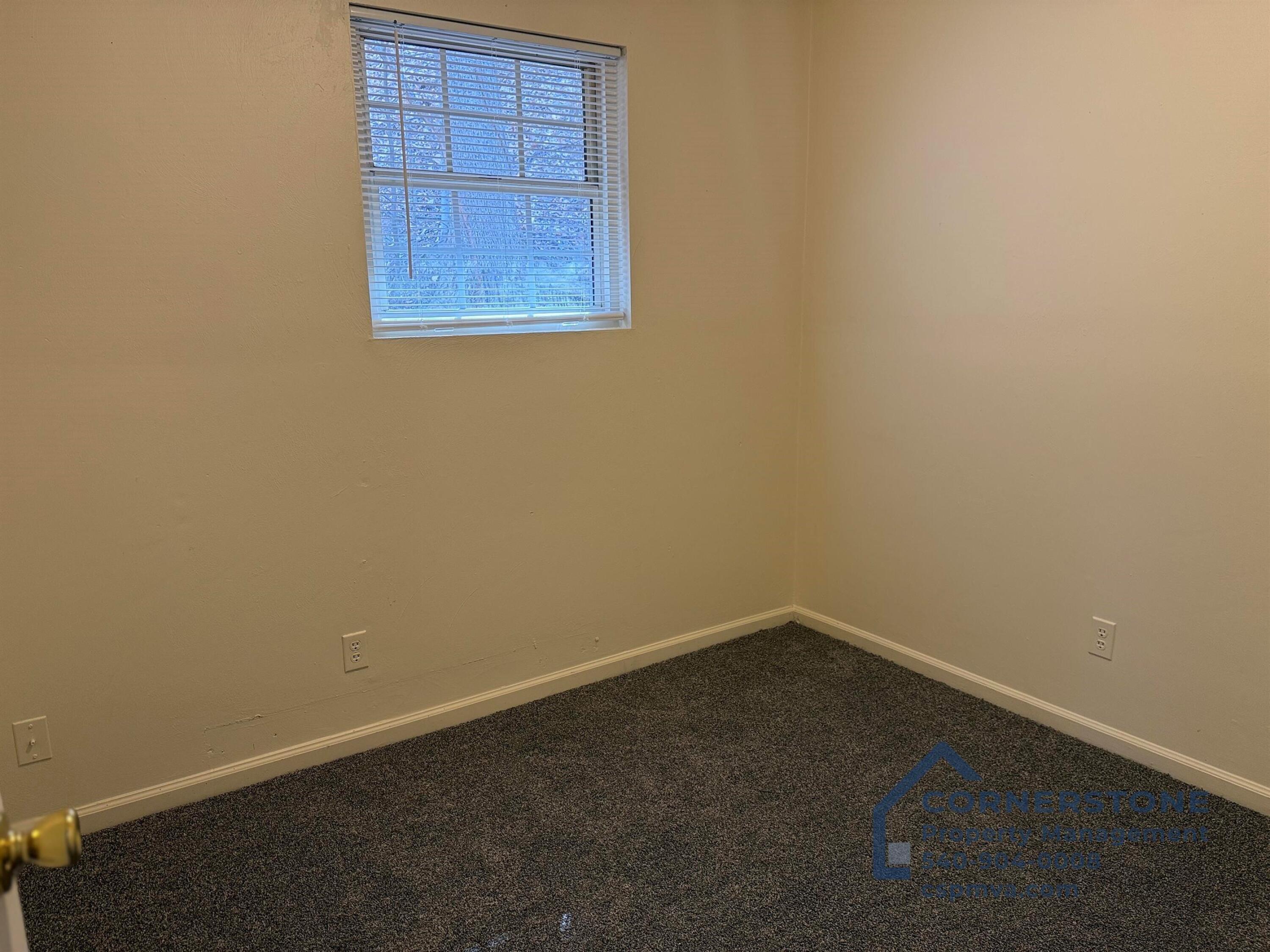 6700 Shingle Rdg Road, Unit 8B Roanoke, VA 24018 - Photo 9 of 13 an empty room with a window