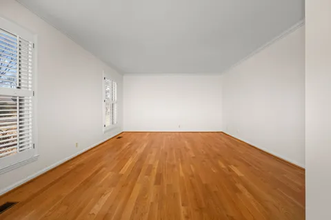 a view of an empty walk in closet