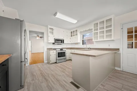 a front view of a house with a patio