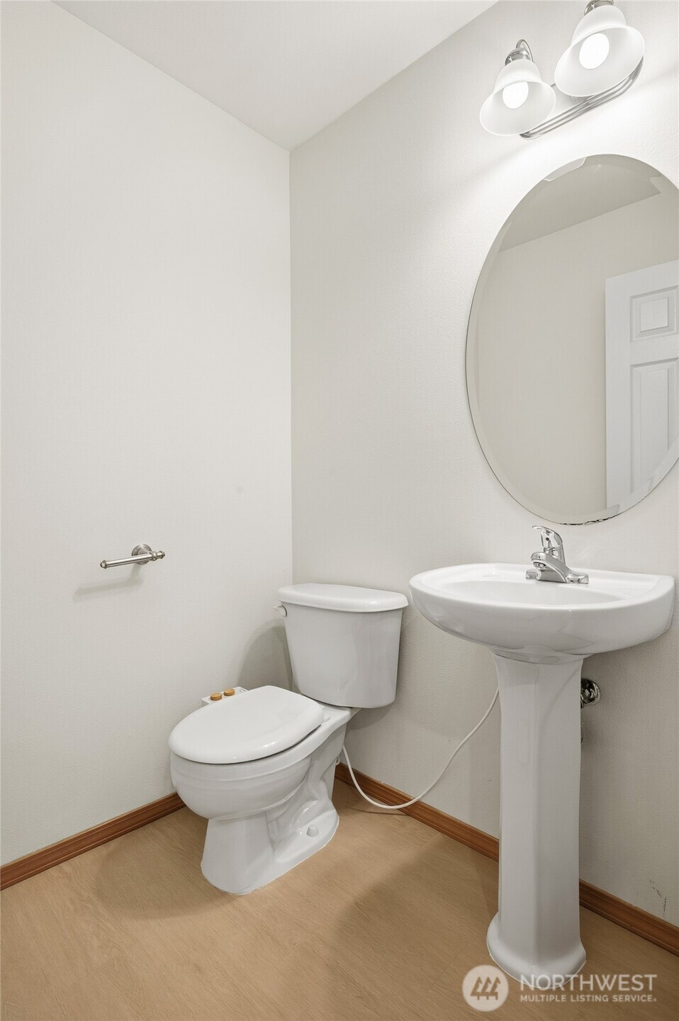 14019 52nd Avenue West, Unit B Edmonds, WA 98026 - Photo 18 of 38 a bathroom with a sink toilet and a mirror