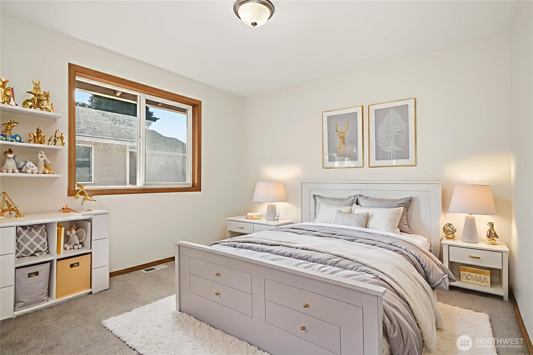 14019 52nd Avenue West, Unit B Edmonds, WA 98026 - Photo 28 of 38 a bedroom with a bed and a cabinets