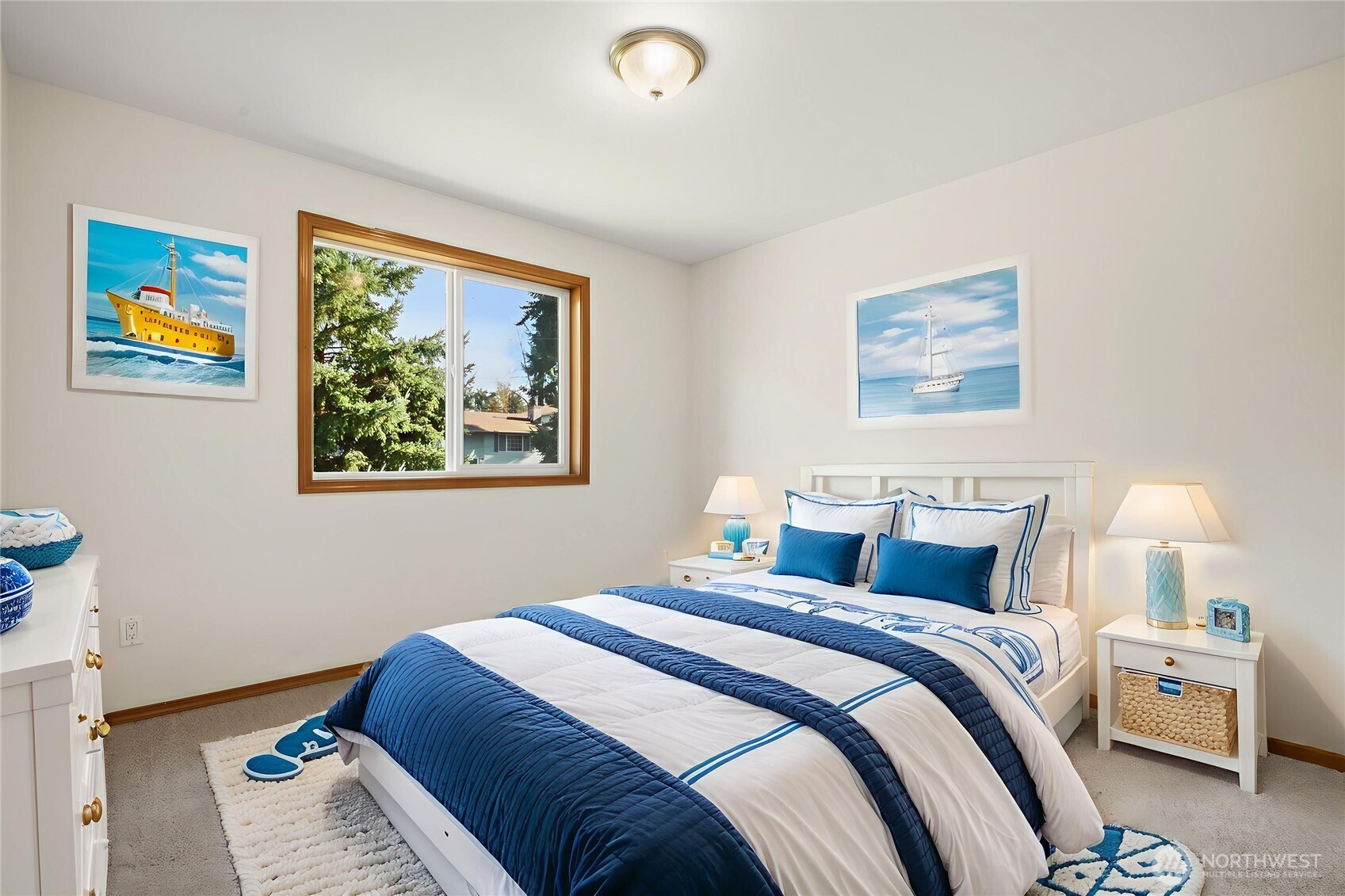 14019 52nd Avenue West, Unit B Edmonds, WA 98026 - Photo 29 of 38 a bedroom with bed and painting on the wall