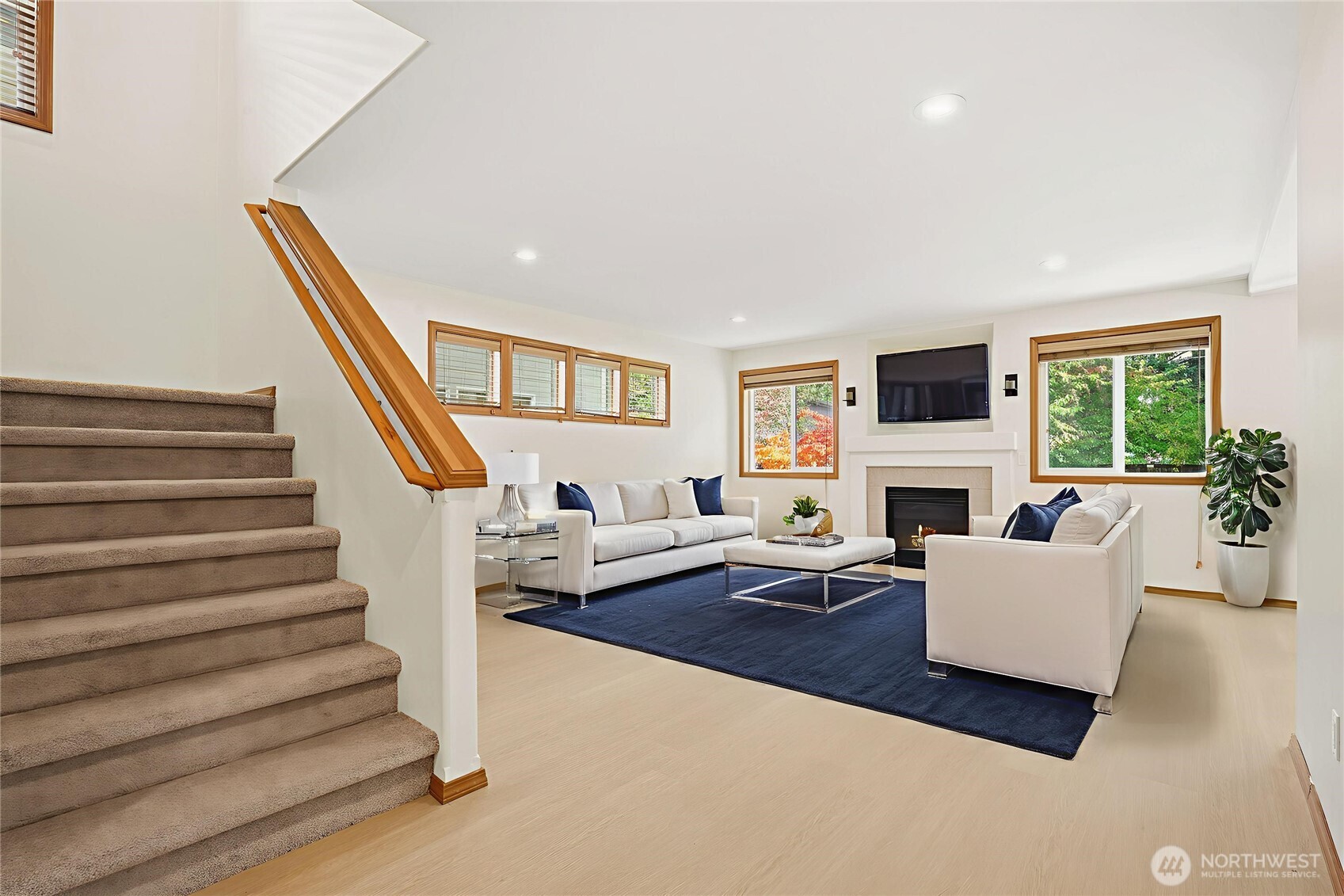 14019 52nd Avenue West, Unit B Edmonds, WA 98026 - Photo 7 of 38 a living room with furniture and a fireplace