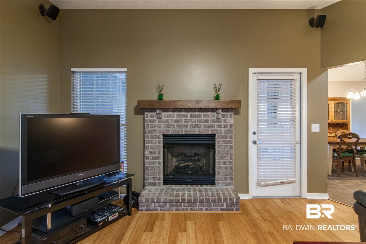 22165 Buck Road Robertsdale, AL 36567 - Photo 28 of 39 Living Room Fireplace