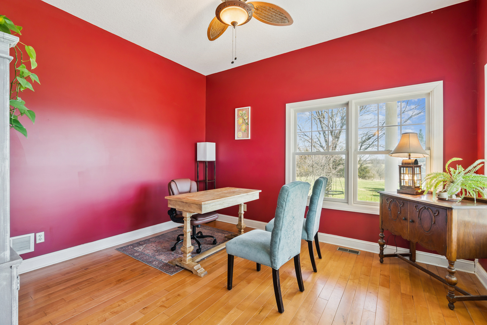 3203 148th Avenue Milan, IL 61264 - Photo 12 of 65 a workspace with furniture window and wooden floor