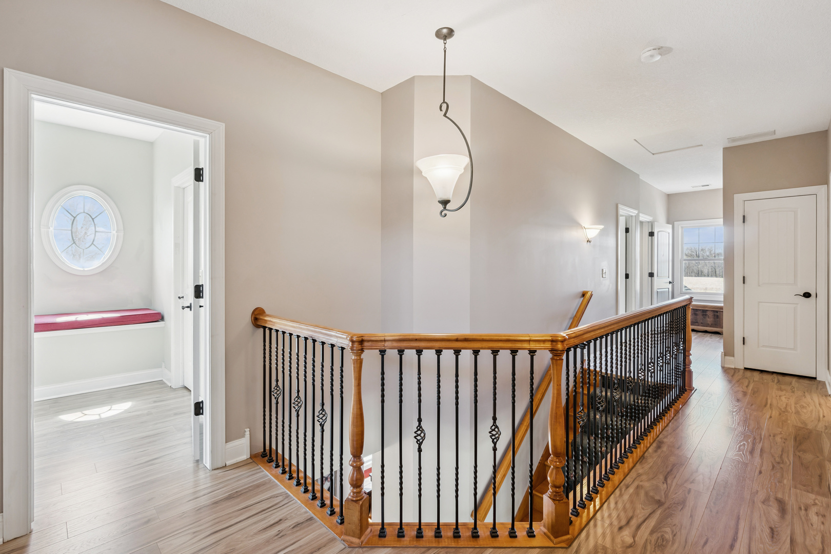 3203 148th Avenue Milan, IL 61264 - Photo 18 of 65 a view of a hallway with wooden floor and staircase