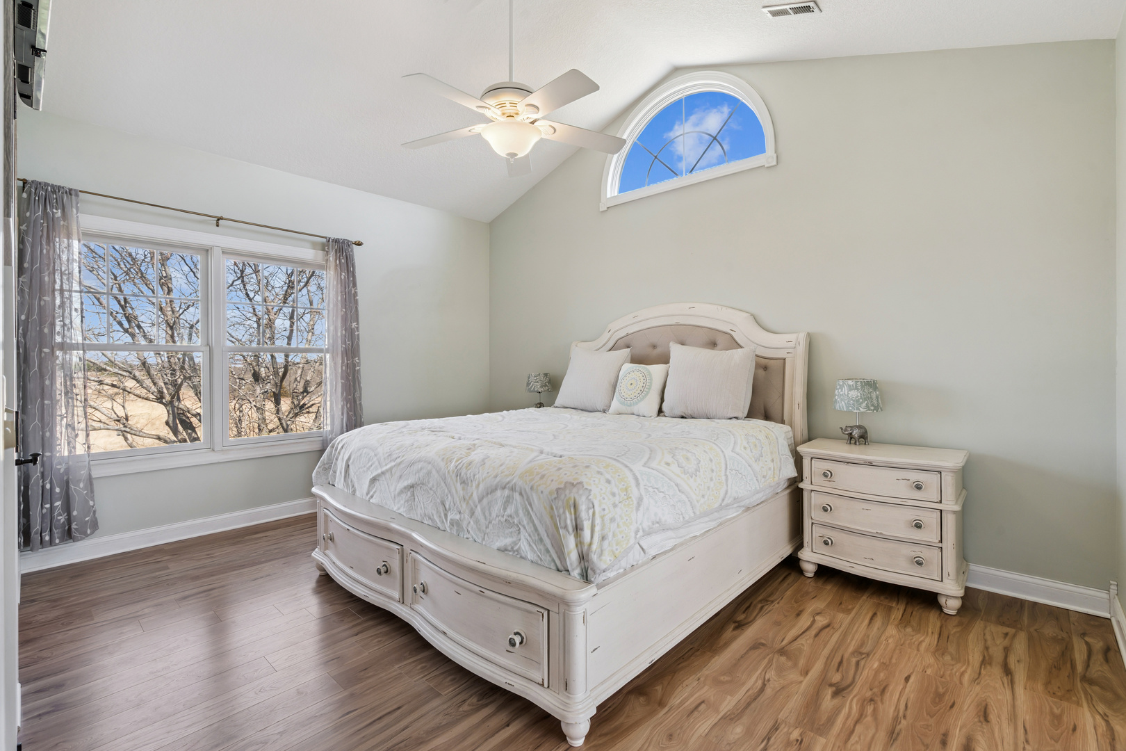 3203 148th Avenue Milan, IL 61264 - Photo 21 of 65 a bed sitting in a bedroom next to a window
