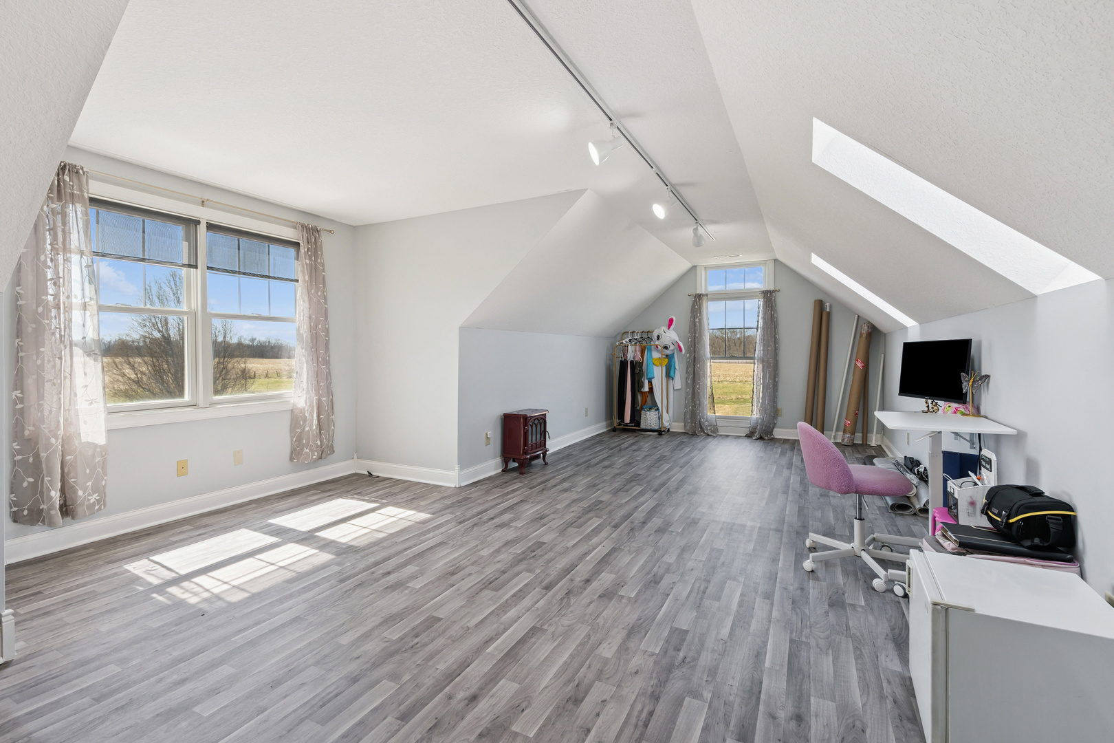 3203 148th Avenue Milan, IL 61264 - Photo 22 of 65 a view of livingroom with hardwood floor and a window