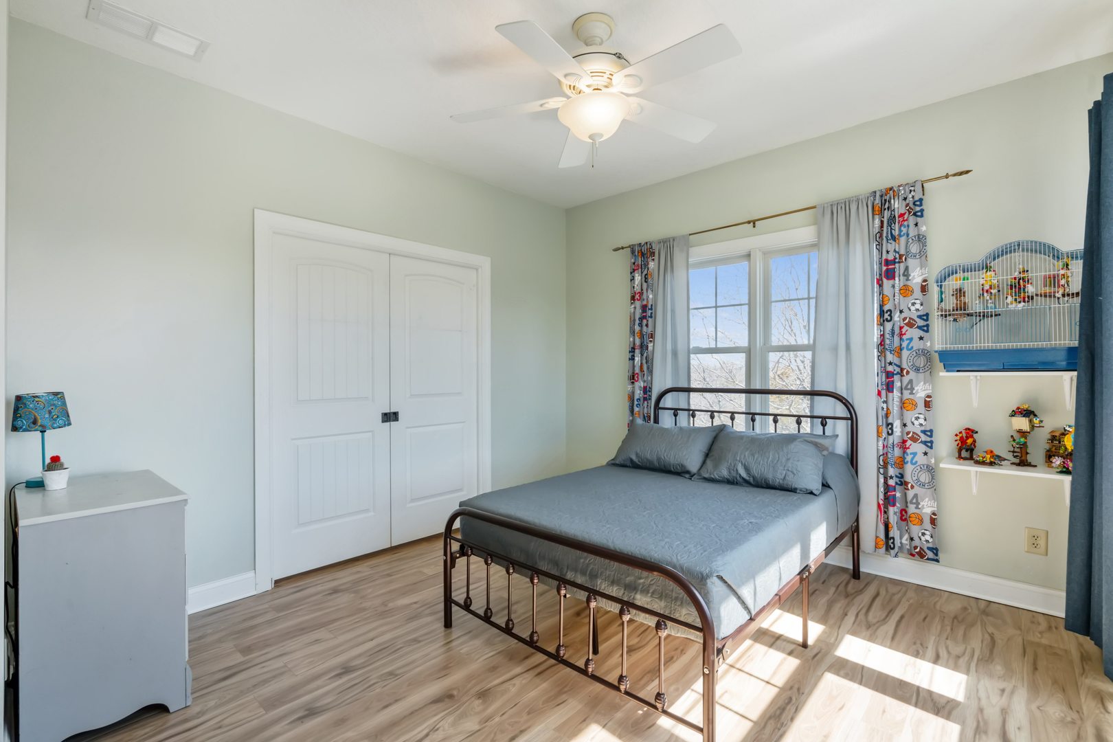 3203 148th Avenue Milan, IL 61264 - Photo 26 of 65 a bedroom with a bed and a table in it
