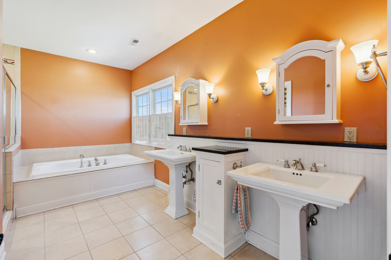3203 148th Avenue Milan, IL 61264 - Photo 31 of 65 a bathroom with a sink and a mirror