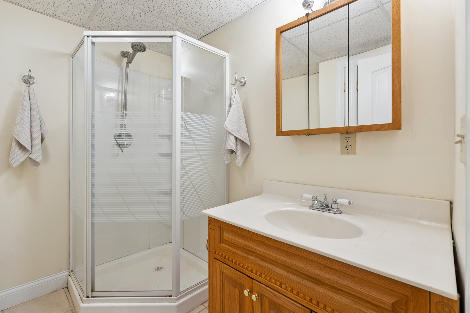 3203 148th Avenue Milan, IL 61264 - Photo 37 of 65 a bathroom with a sink and a mirror
