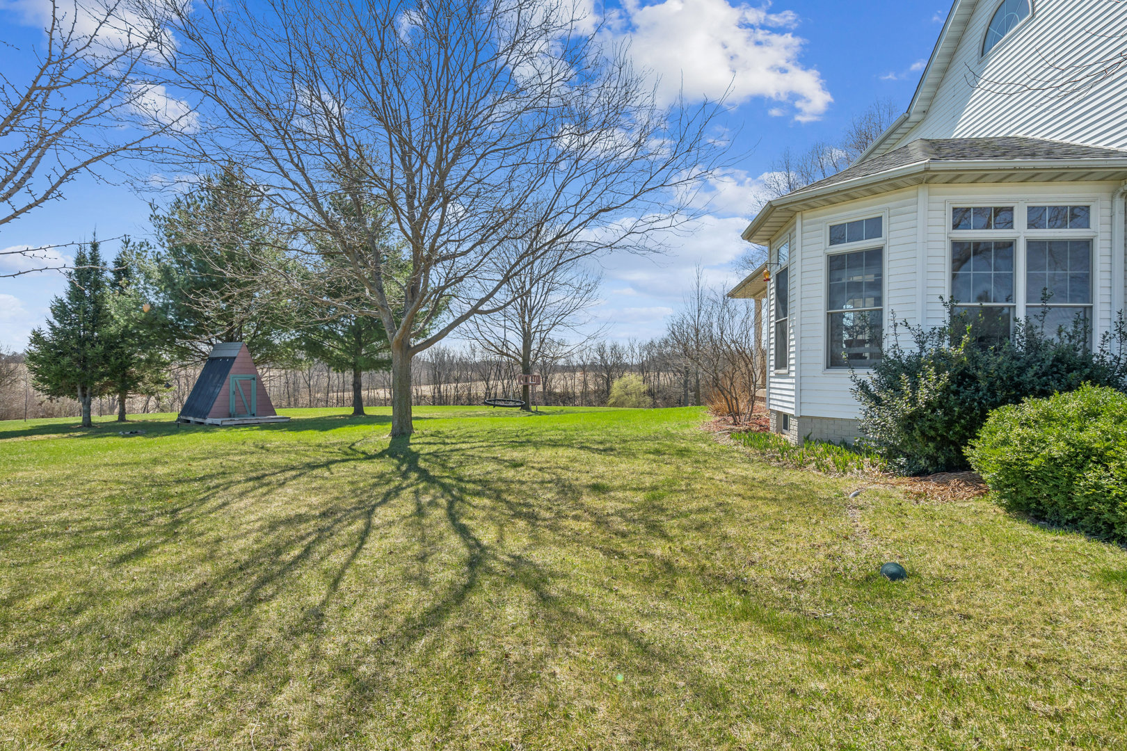 3203 148th Avenue Milan, IL 61264 - Photo 41 of 65 a view of a house with a yard