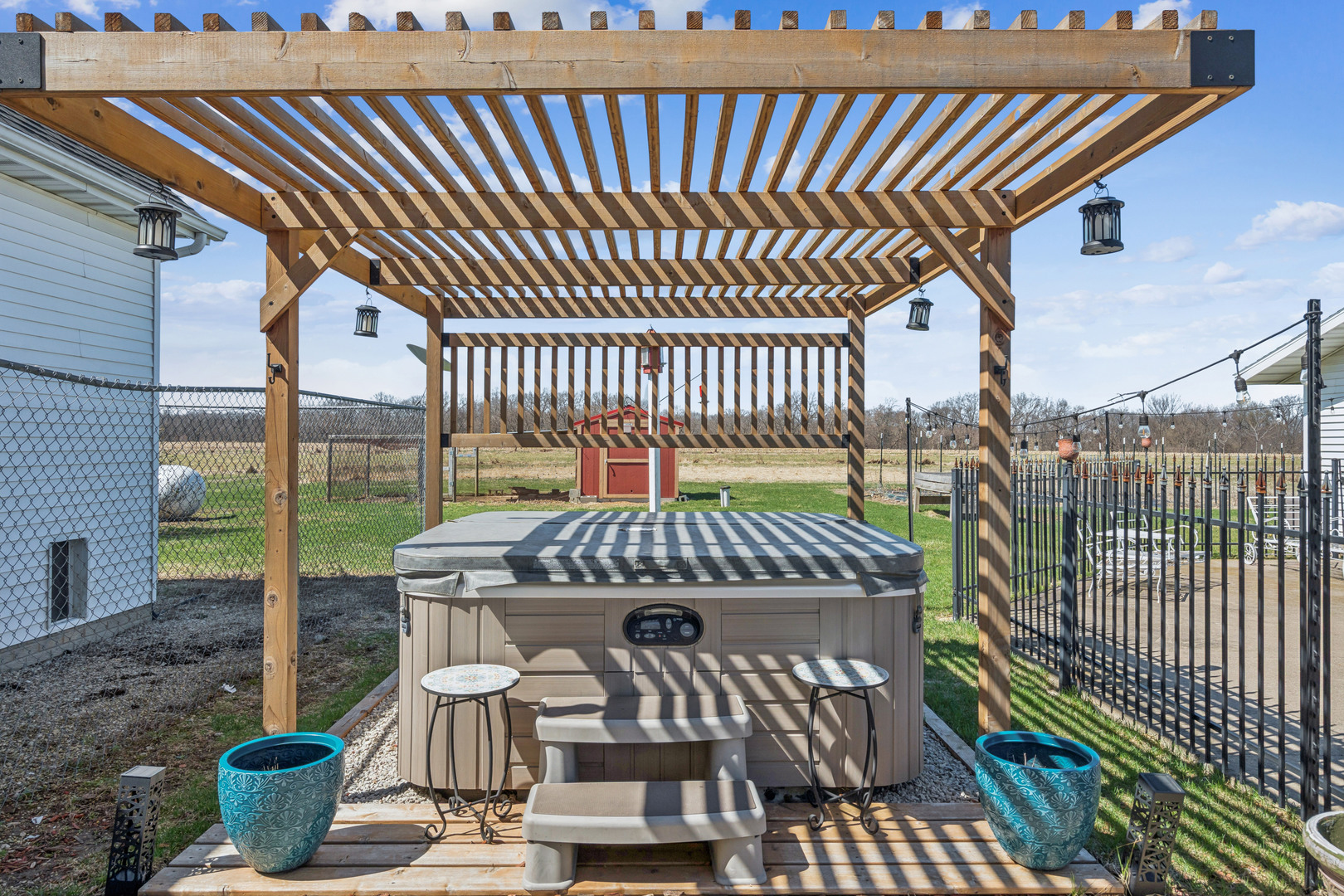 3203 148th Avenue Milan, IL 61264 - Photo 42 of 65 a view of a patio with table and chairs and wooden floor
