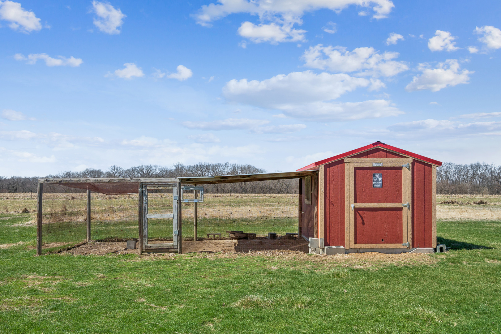 3203 148th Avenue Milan, IL 61264 - Photo 45 of 65 a view of a yard in front of a house with a yard